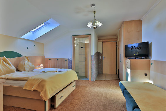 Double bed at apartement 8 at hotel Garni Zerza