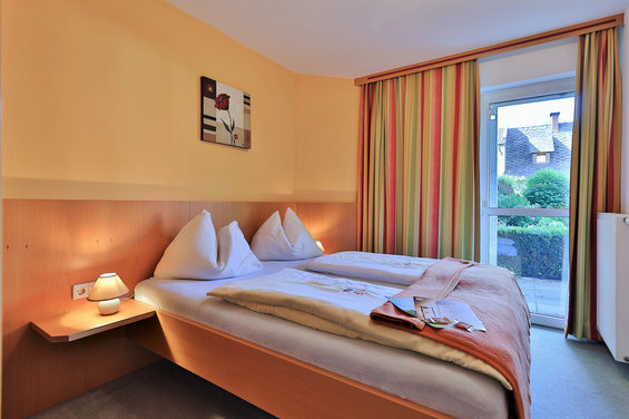 Bedroom at apartement Hänsel & Gretel 1 at hotel Garni Zerza