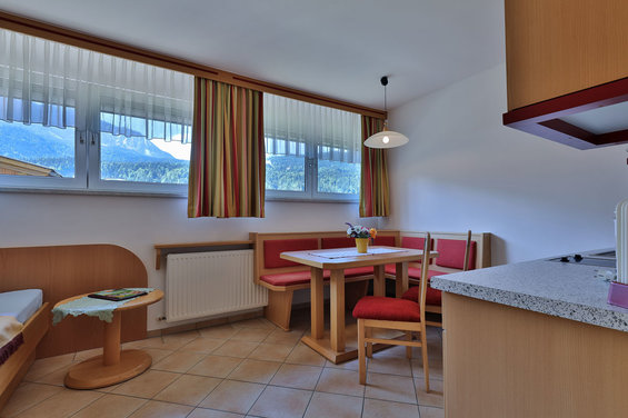 Living area at apartement Schneewittchen at hotel Garni Zerza